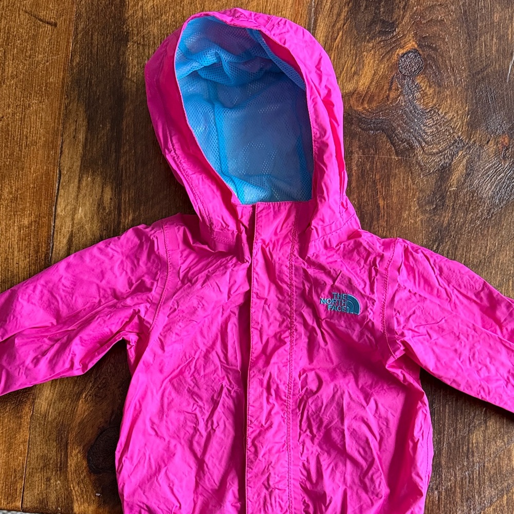 The North Face Vibrant Pink Jacket with Blue Lining